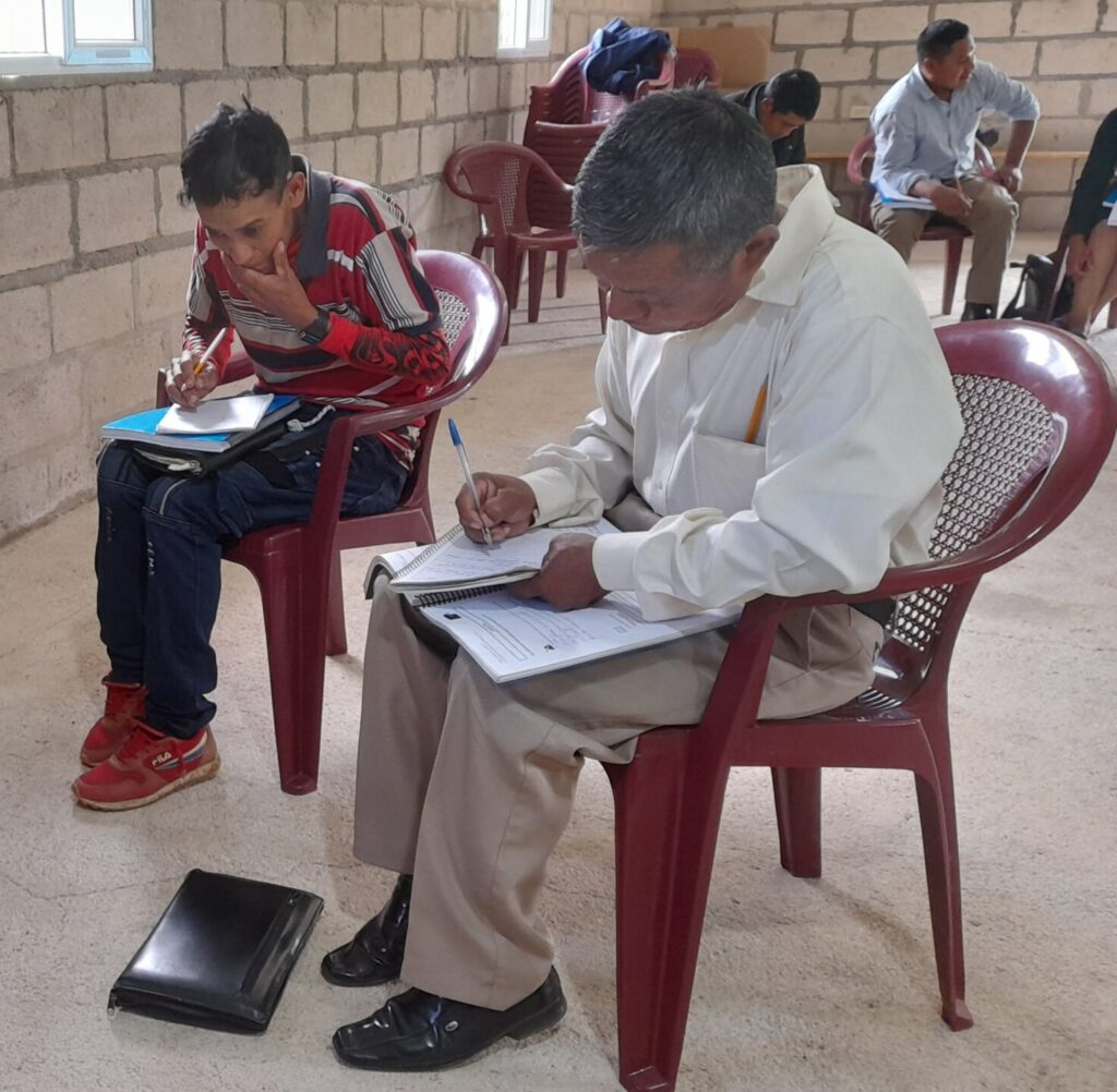 Pastor Jesús Corea with men